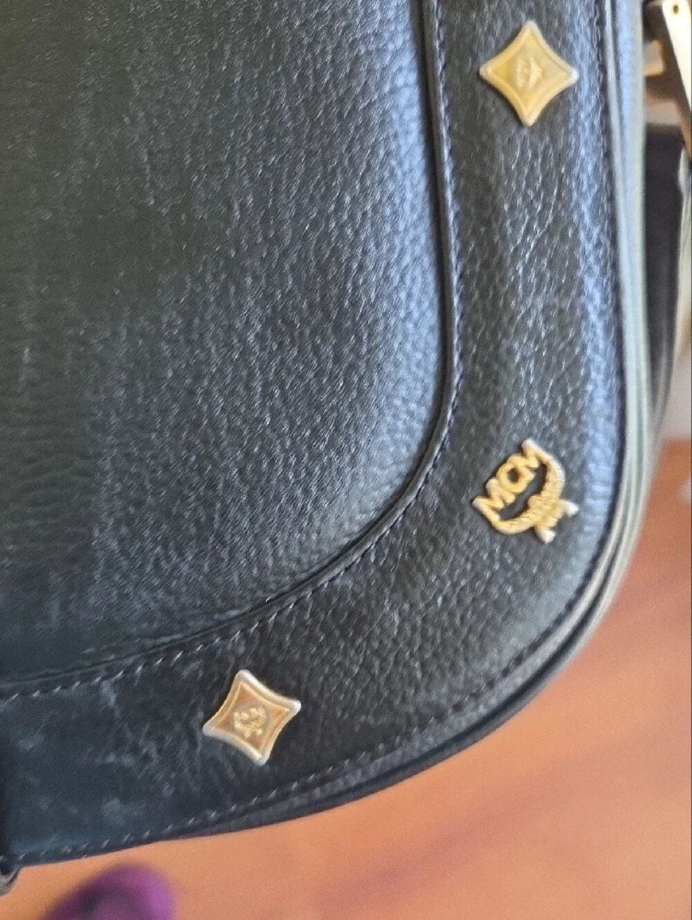 MCM Black Leather Crossbody Bag with Gold Hardware